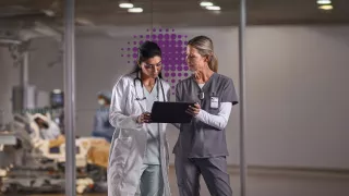 Nurses looking at screen